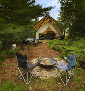 Beaver Island Retreat private Safari tent and fire pit.