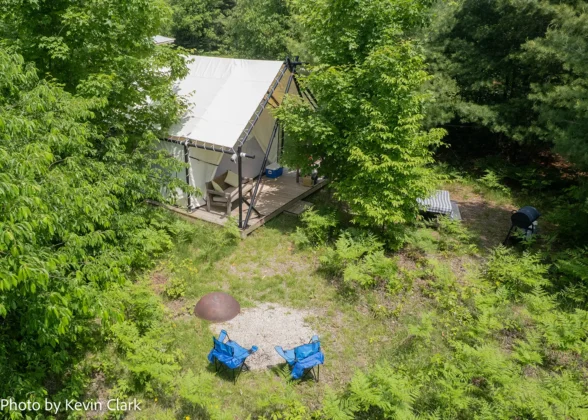 Beaver Island Retreat Private Safari Tent. Tucked into the trees. Photo courtesy of Beaver Island Retreat.