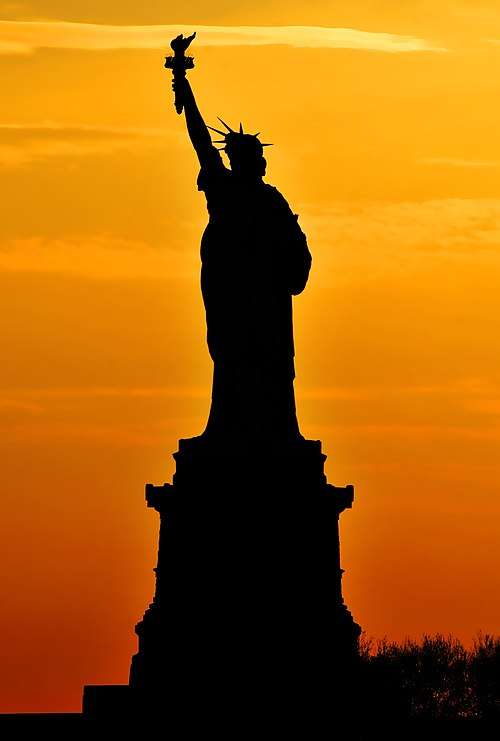 The Statue of Liberty at Sunset.